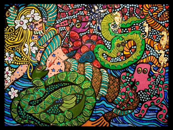 Mermaid wrapped in sea snakes